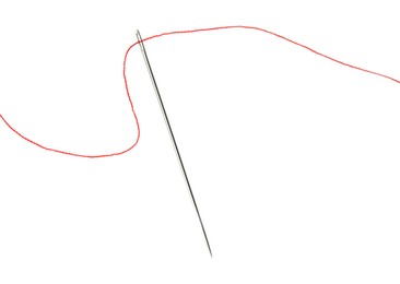 Photo of Sewing needle with red thread isolated on white