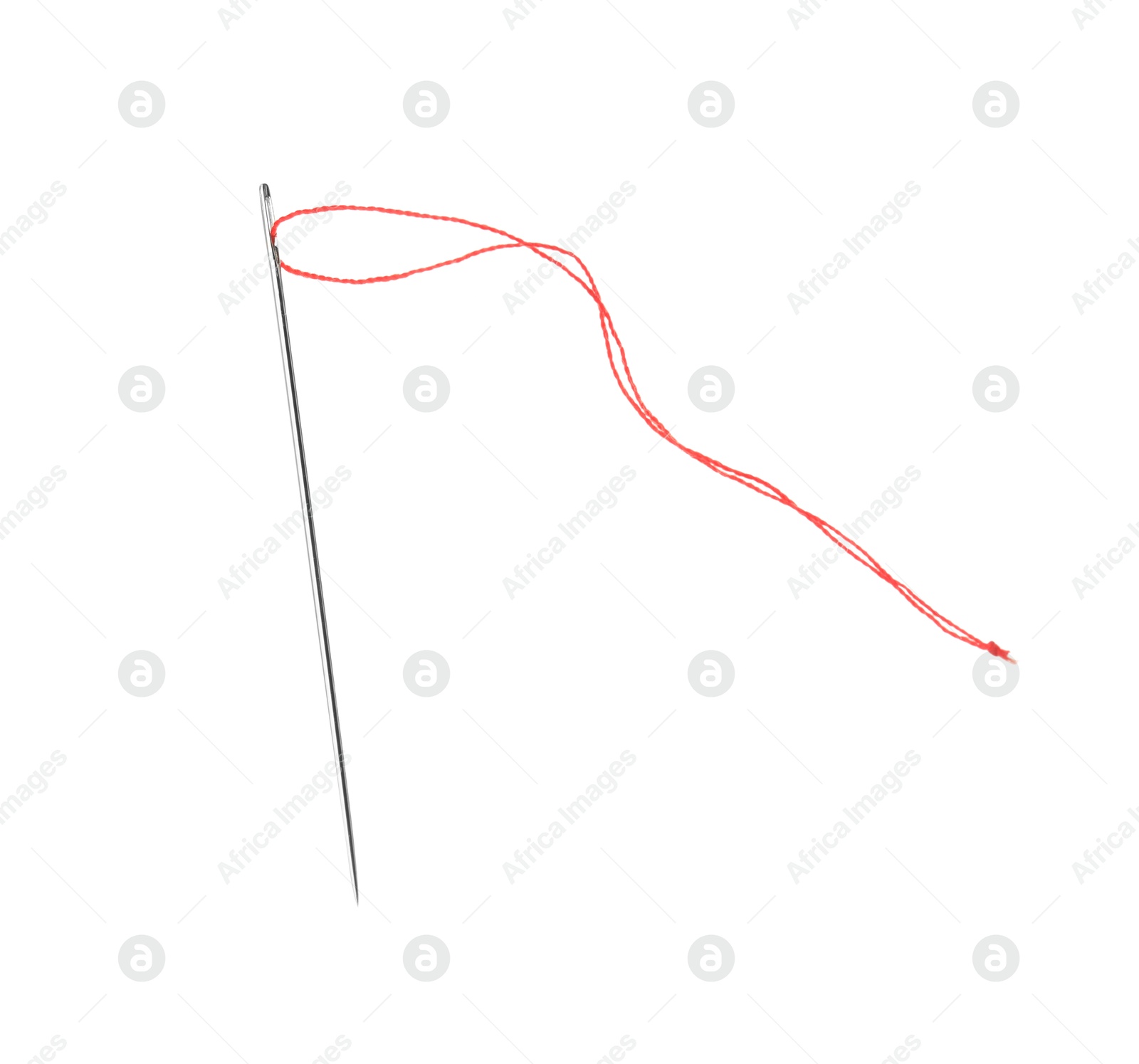 Photo of Sewing needle with red thread isolated on white