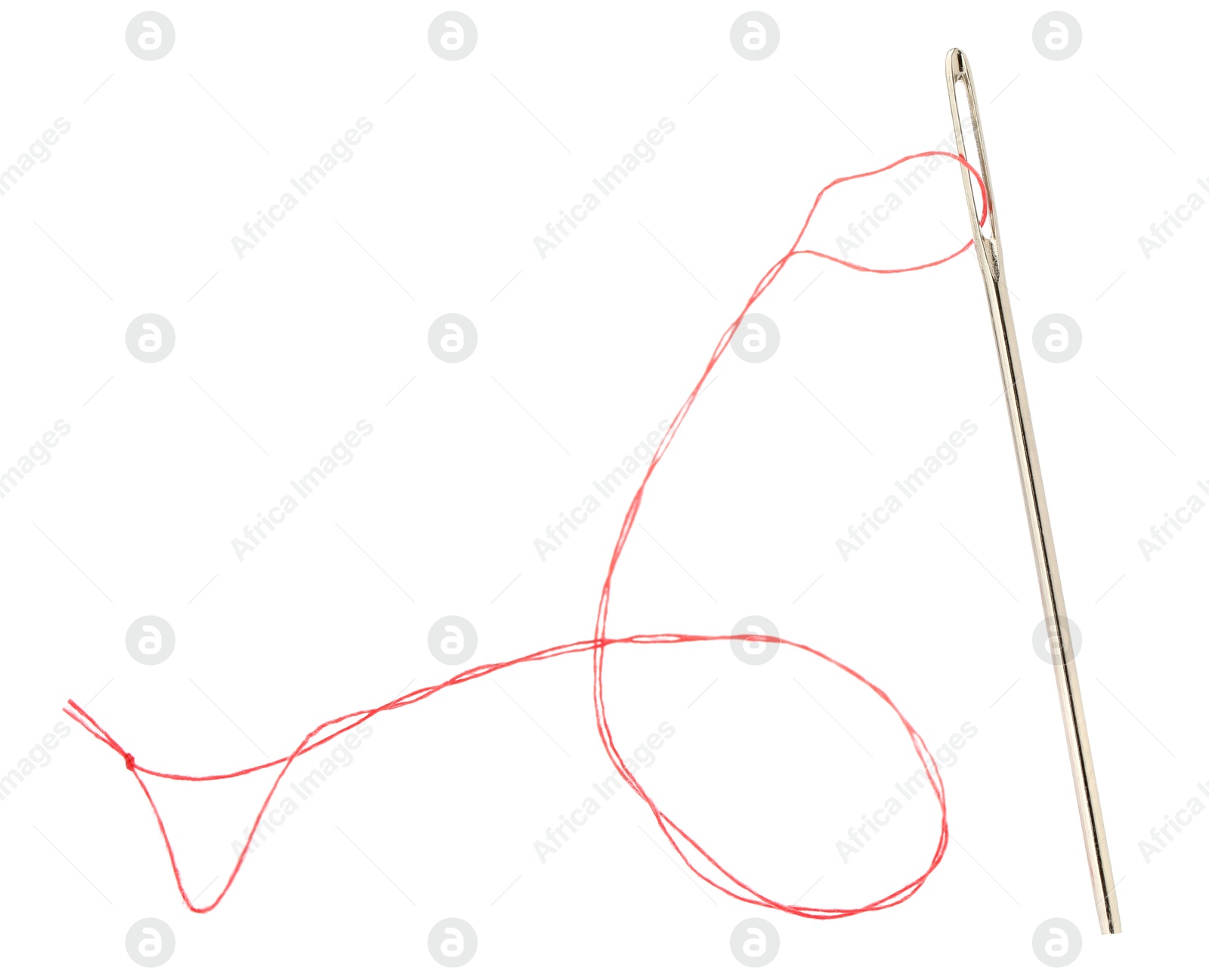 Photo of Sewing needle with red thread isolated on white