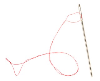 Photo of Sewing needle with red thread isolated on white