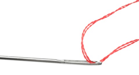 Sewing needle with red thread isolated on white, closeup