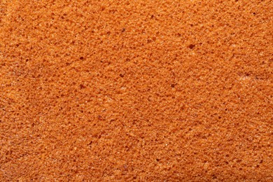 Photo of Tasty sponge cake as background, top view