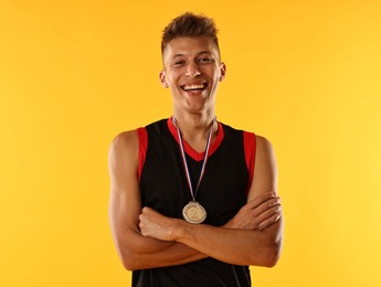 Photo of Happy winner with silver medal on yellow background