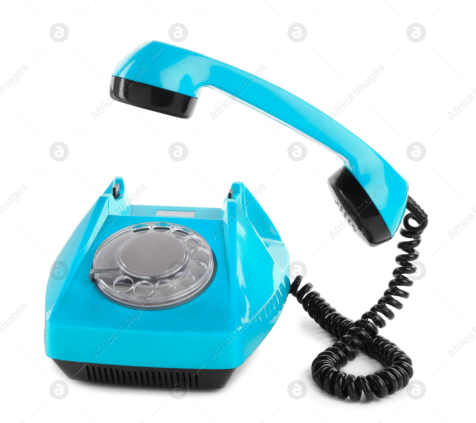 Image of Old light blue telephone with rotary dial isolated on white