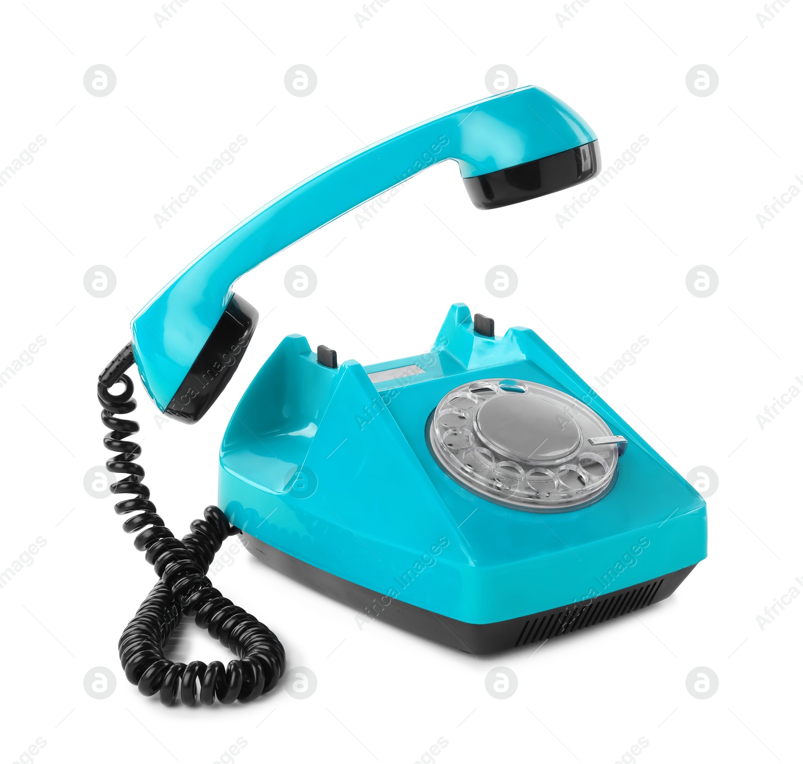 Image of Old light blue telephone with rotary dial isolated on white