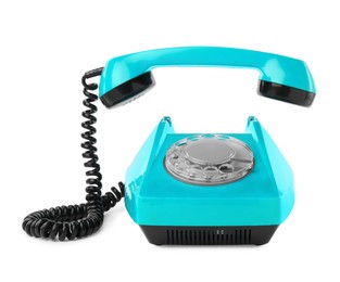 Image of Old light blue telephone with rotary dial isolated on white