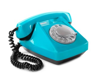 Image of Old light blue telephone with rotary dial isolated on white