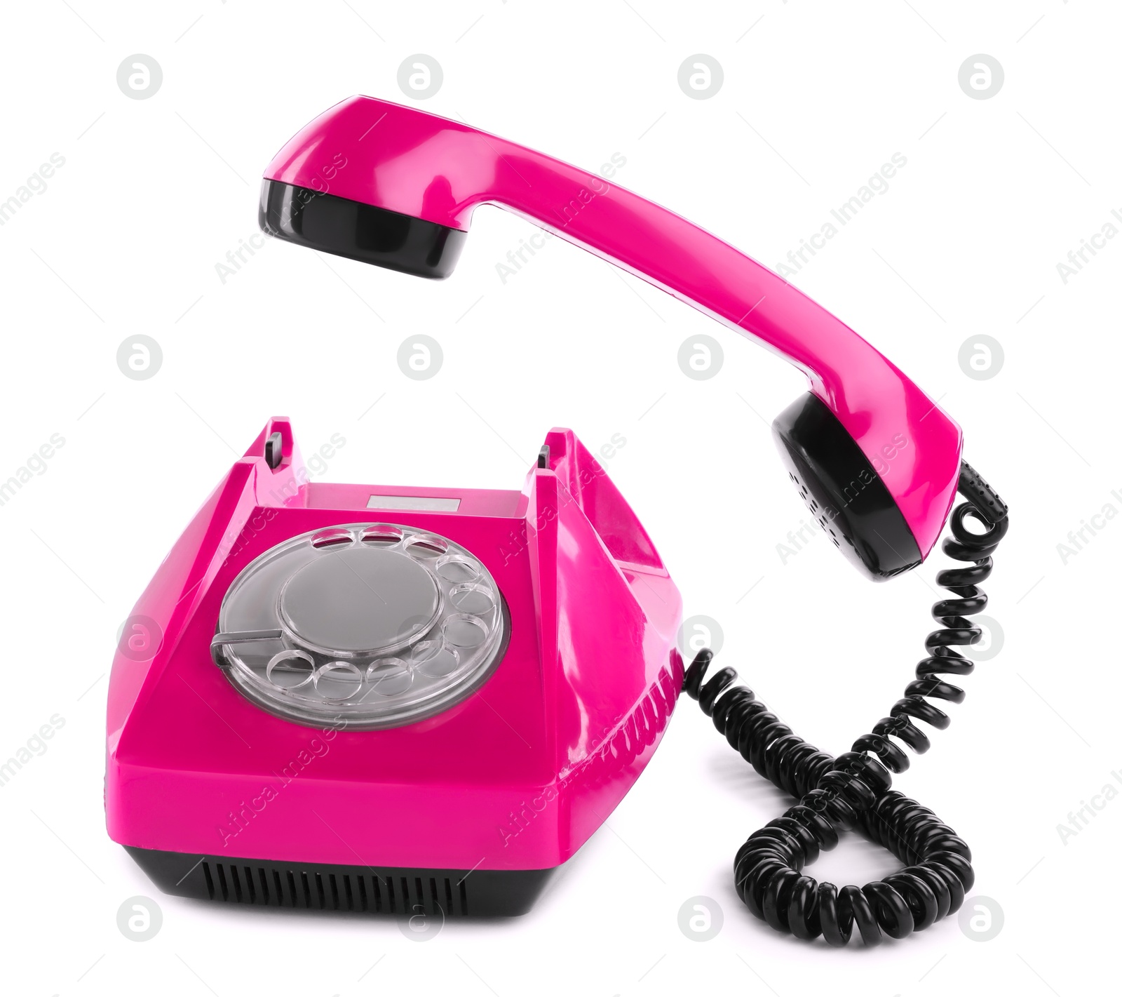 Image of Old magenta color telephone with rotary dial isolated on white