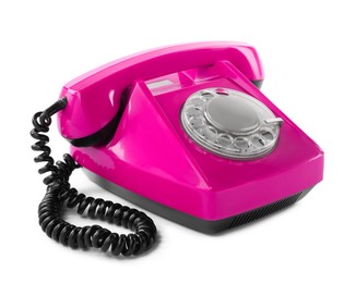 Image of Old magenta color telephone with rotary dial isolated on white