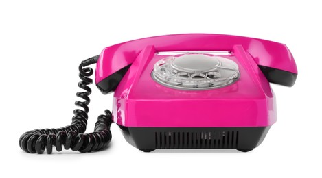 Image of Old magenta color telephone with rotary dial isolated on white