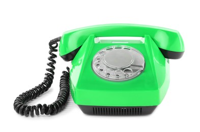 Image of Old green telephone with rotary dial isolated on white