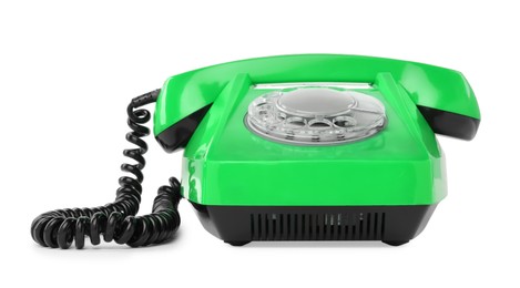 Image of Old green telephone with rotary dial isolated on white