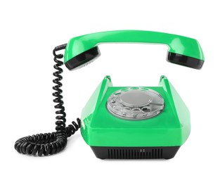 Image of Old green telephone with rotary dial isolated on white