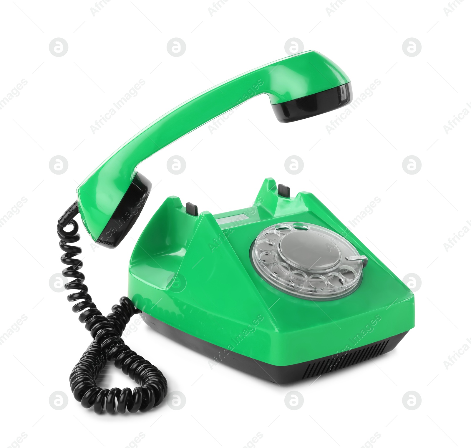 Image of Old green telephone with rotary dial isolated on white