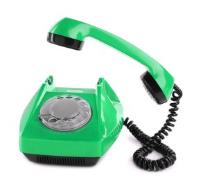 Image of Old green telephone with rotary dial isolated on white