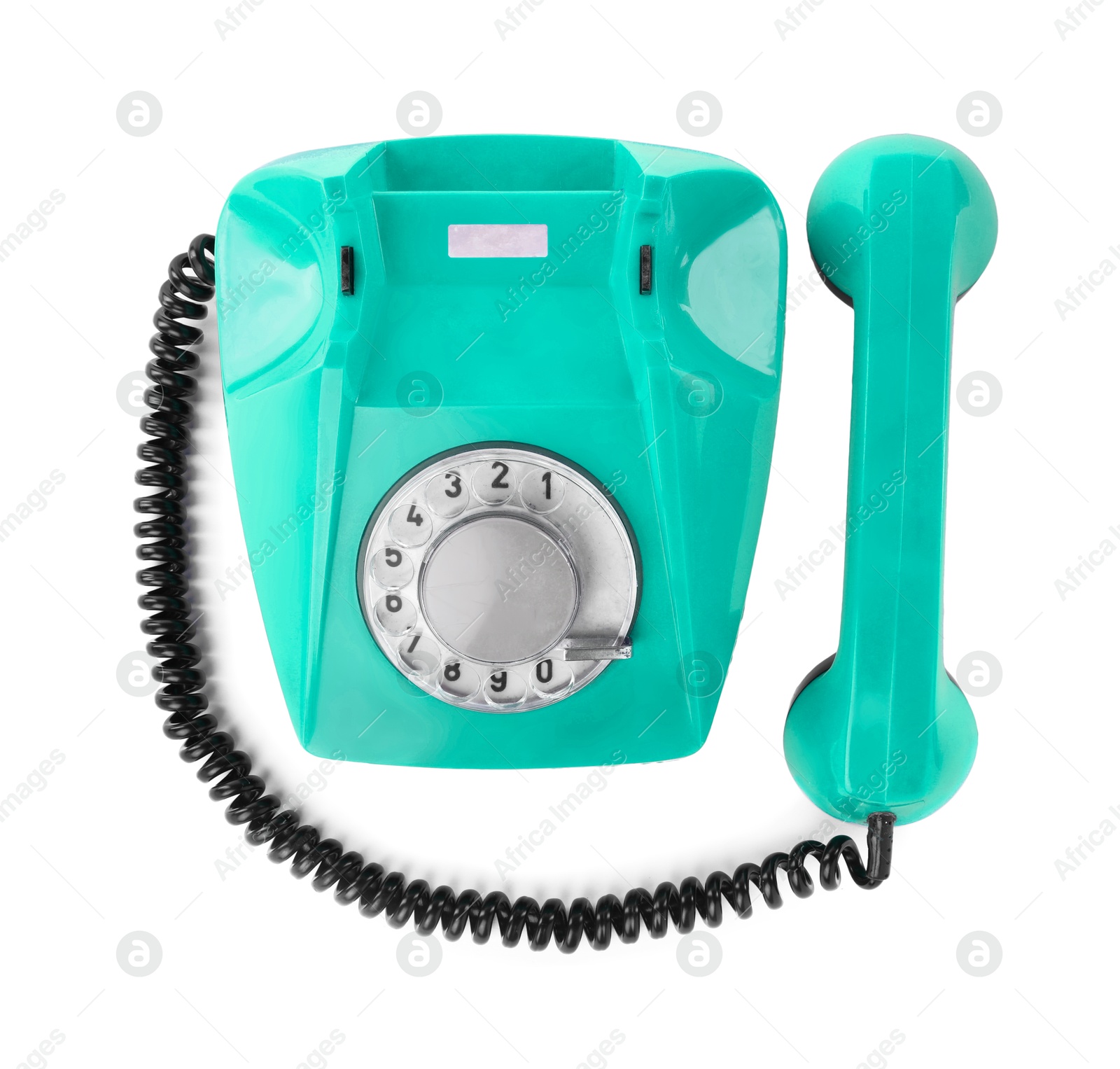 Image of Old turquoise color telephone with rotary dial isolated on white, top view