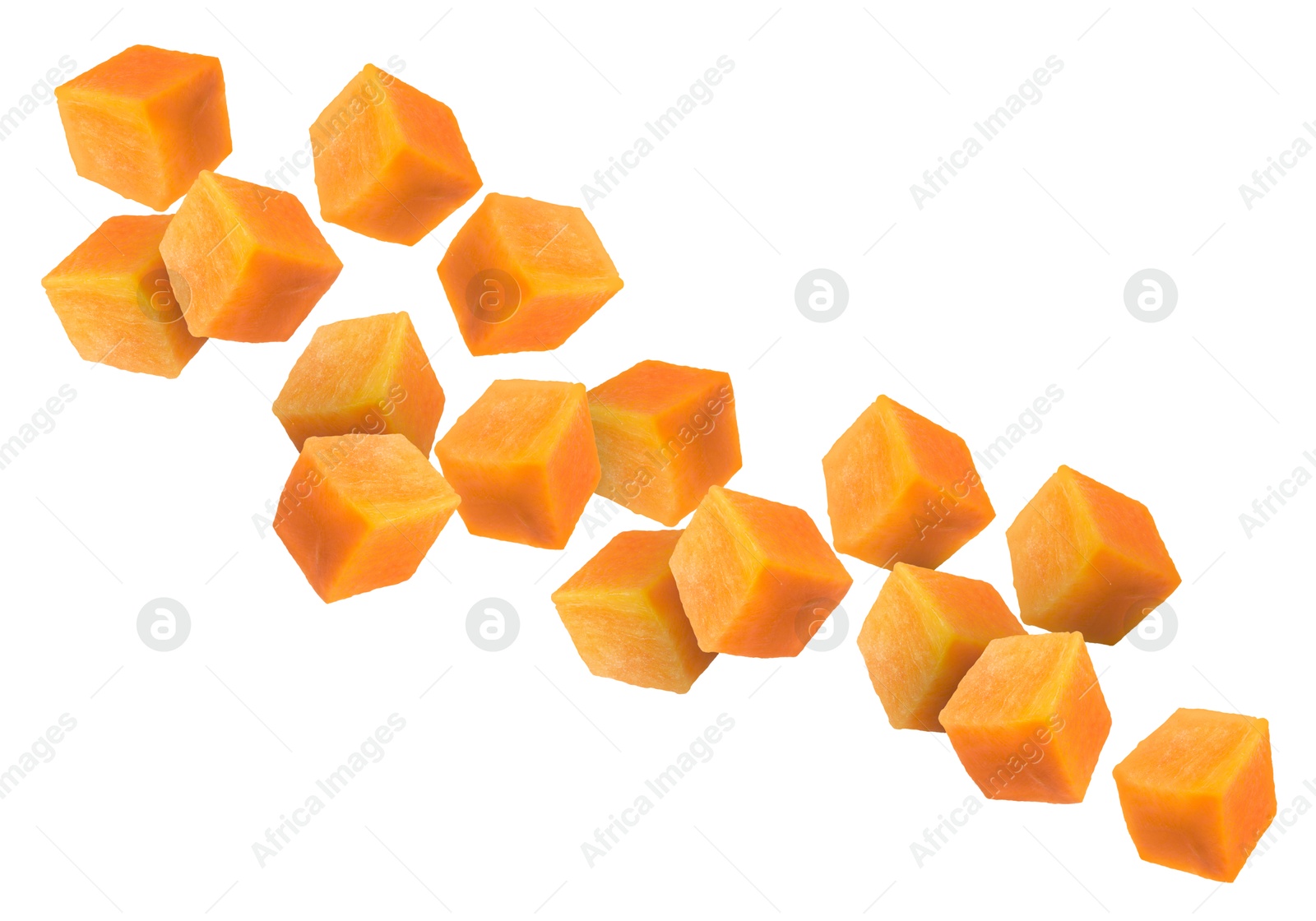 Image of Carrot cubes in air on white background