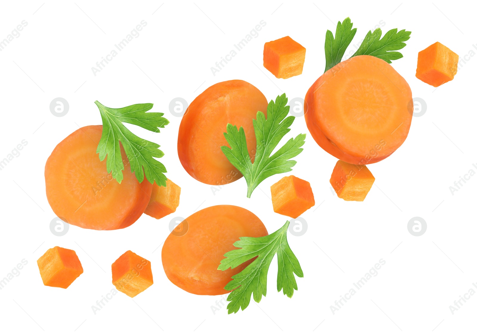 Image of Sliced carrot and parsley in air on white background