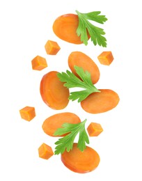 Image of Sliced carrot and parsley in air on white background