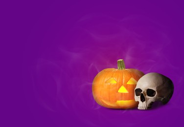 Image of Spooky glowing jack o'lantern and scary skull on purple background, space for text. Halloween celebration