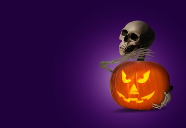 Image of Scary skeleton hugging spooky jack o'lantern on purple background, space for text. Halloween celebration