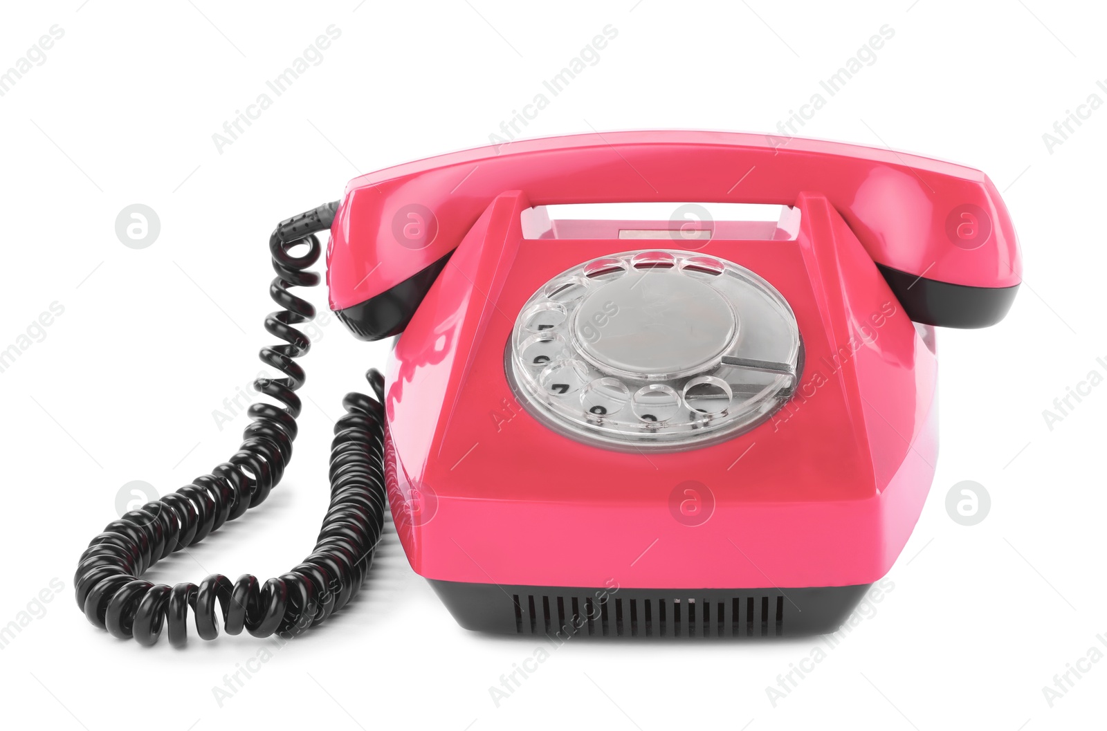 Image of Old pink telephone with rotary dial isolated on white