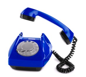 Image of Old blue telephone with rotary dial isolated on white