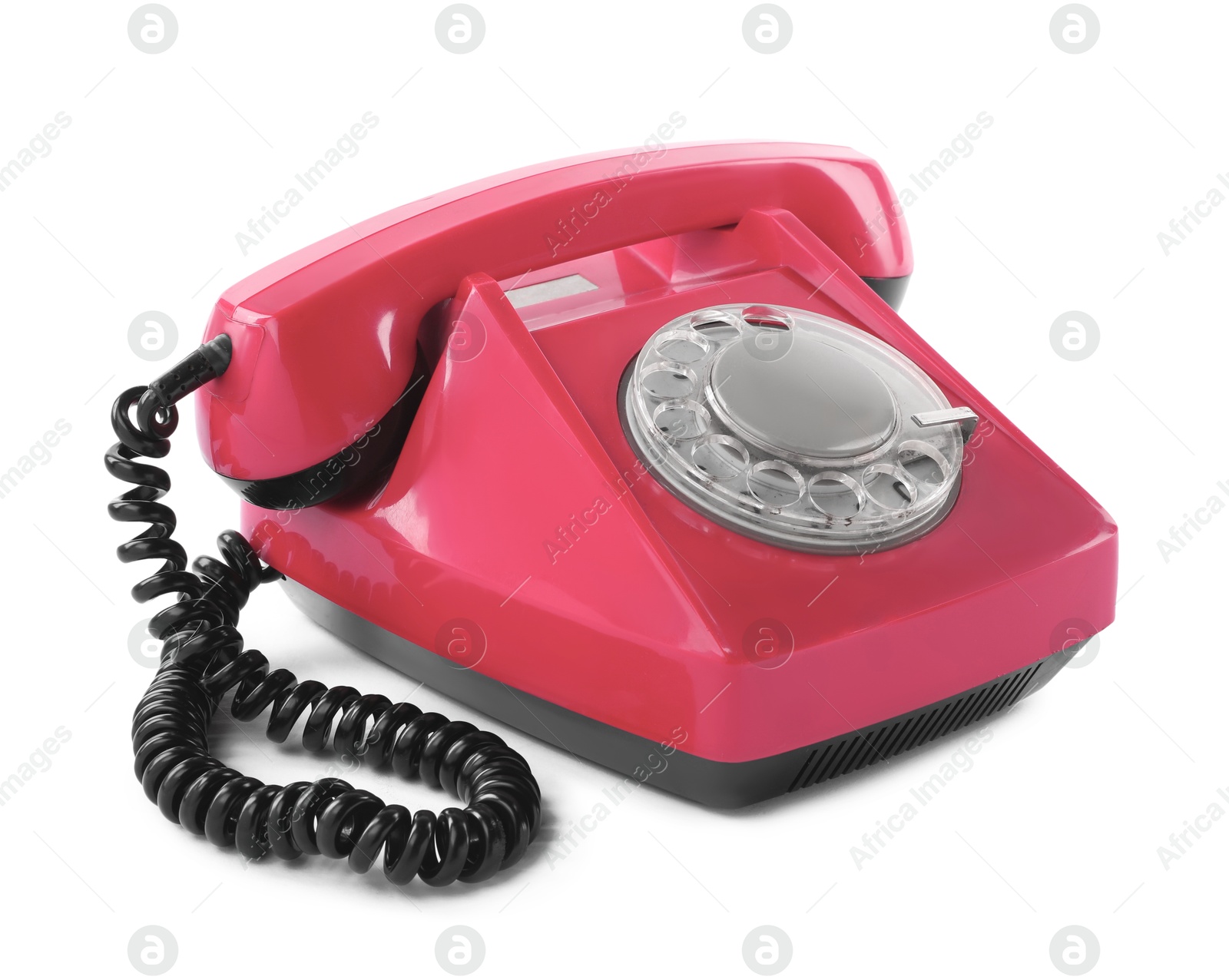 Image of Old pink telephone with rotary dial isolated on white