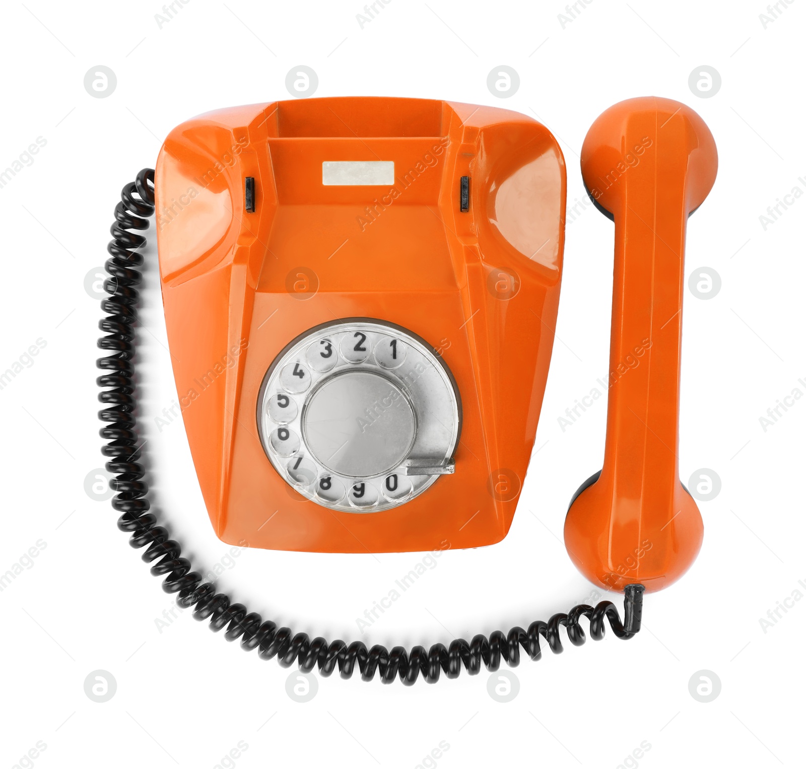 Image of Old orange telephone with rotary dial isolated on white, top view