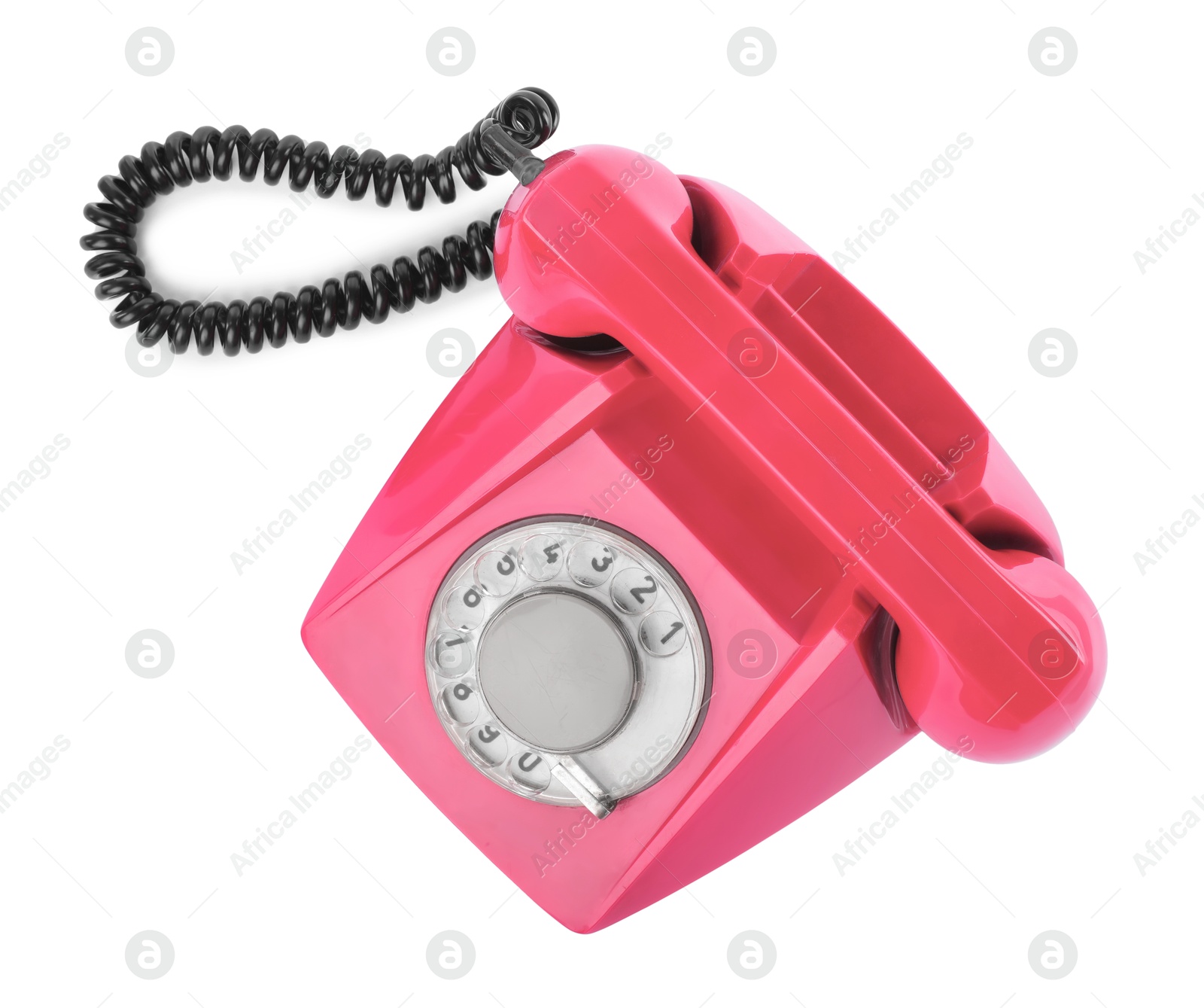 Image of Old pink telephone with rotary dial isolated on white, top view