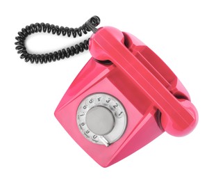 Image of Old pink telephone with rotary dial isolated on white, top view