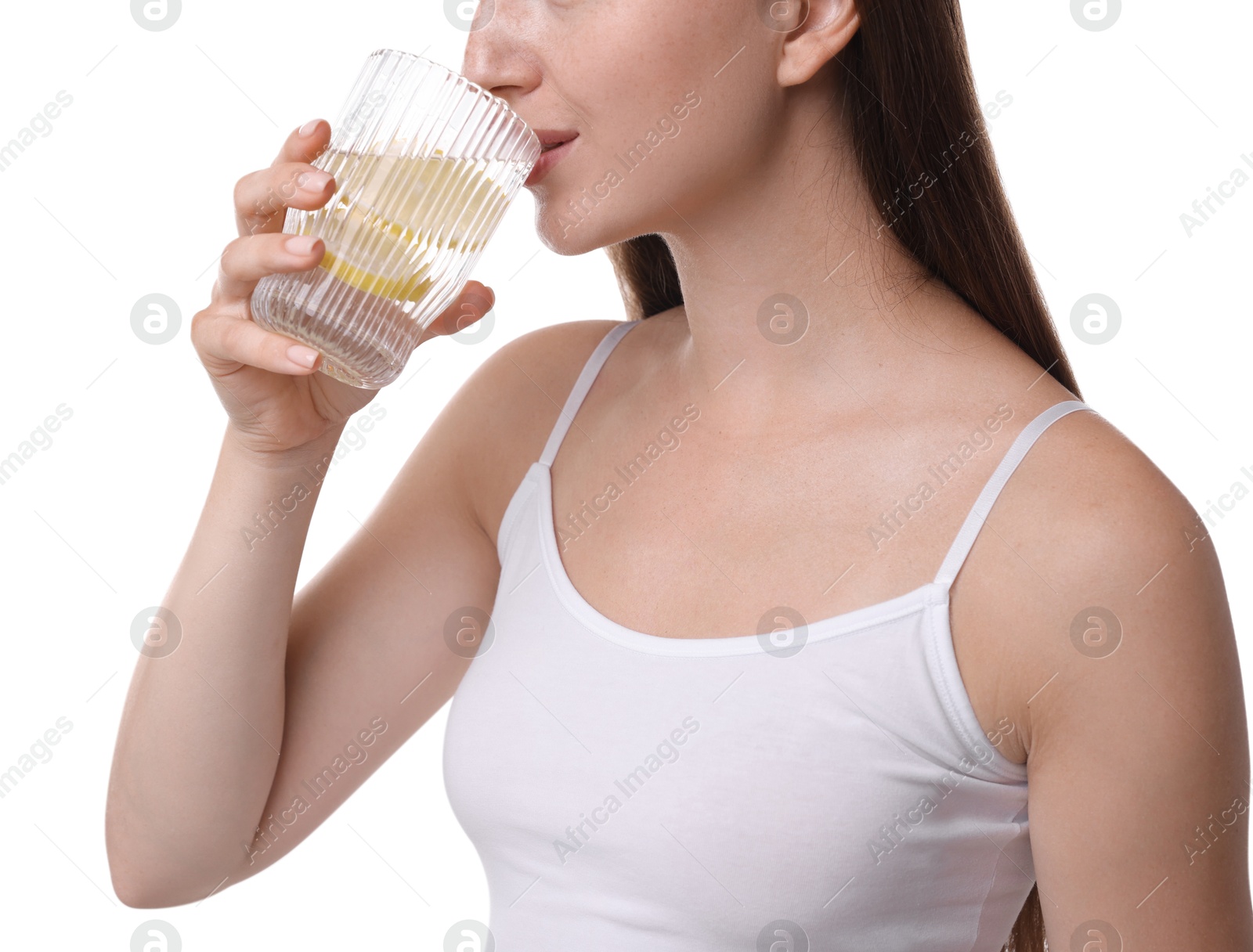 Photo of Woman drinking water with lemon on white background