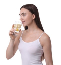 Photo of Woman drinking water with lemon on white background