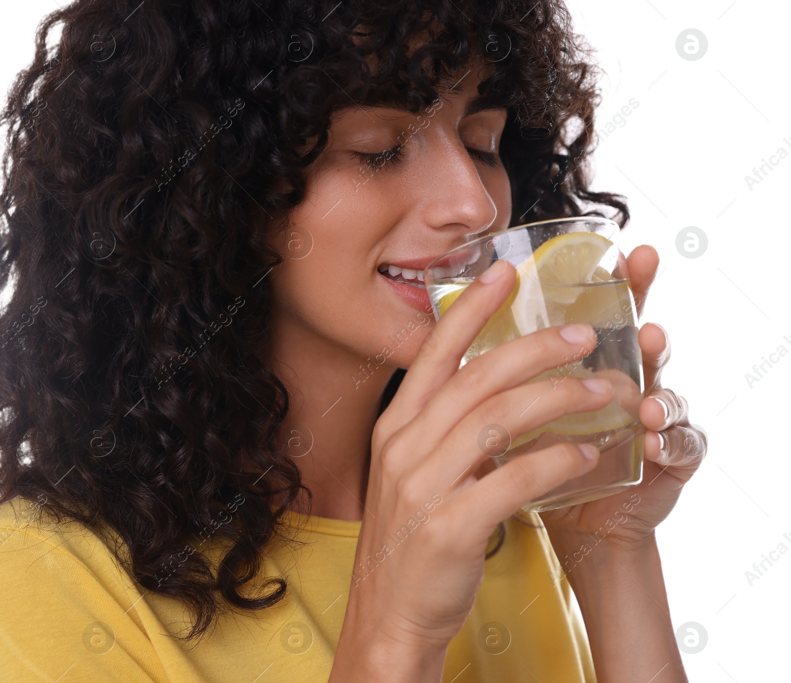 Photo of Woman drinking water with lemon on white background