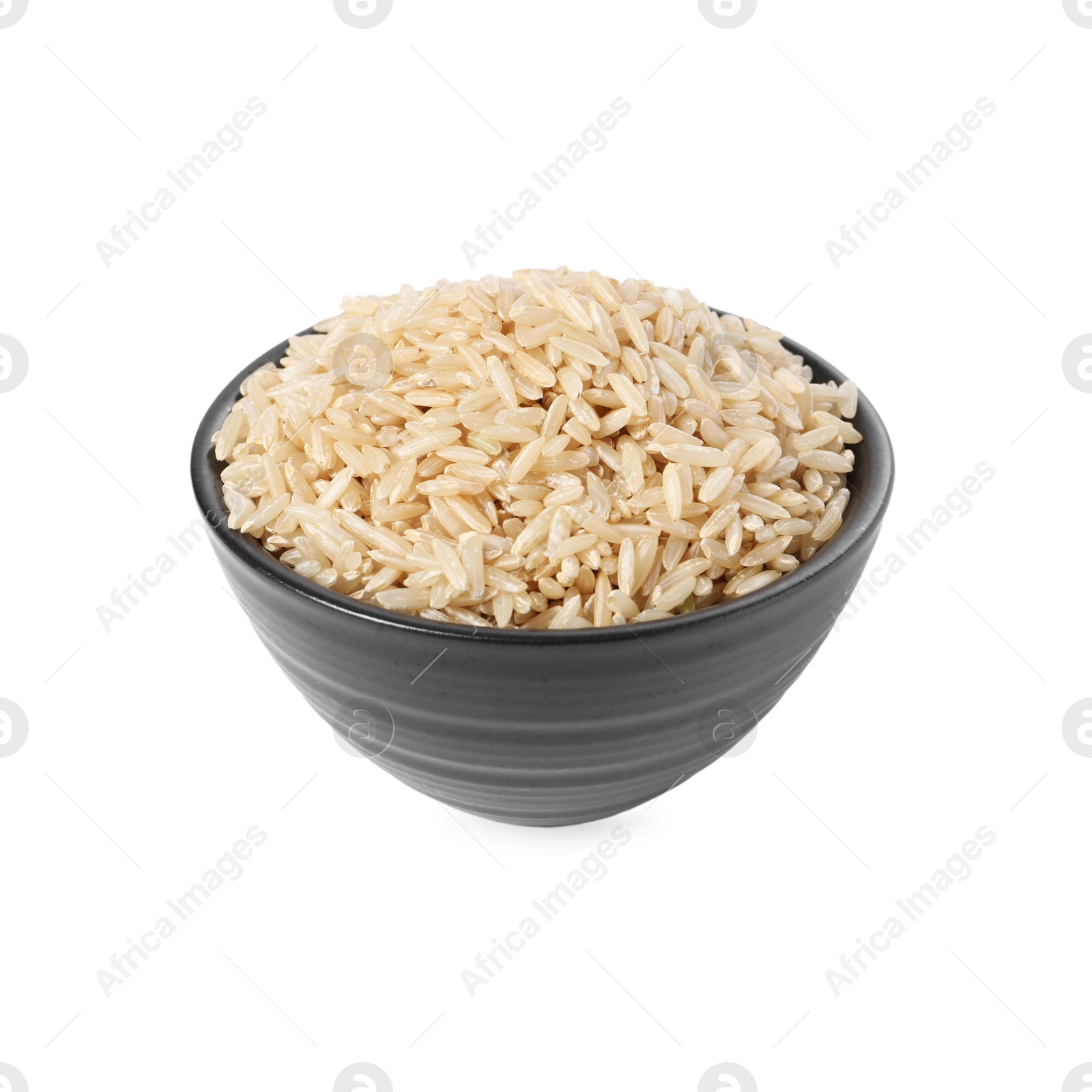 Photo of Raw rice in bowl isolated on white