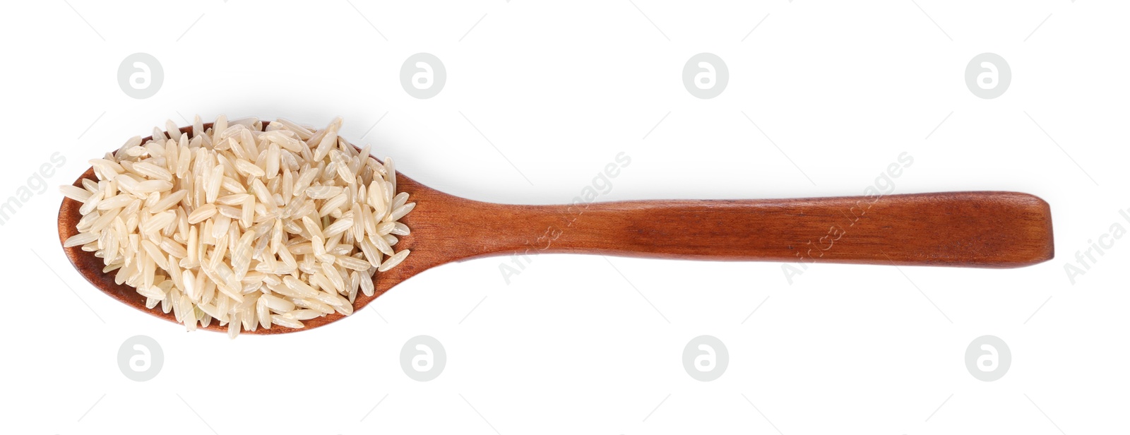 Photo of Raw rice in wooden spoon isolated on white, top view