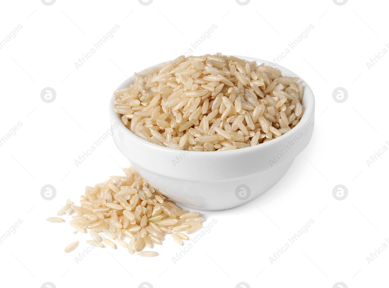 Photo of Raw rice in bowl isolated on white