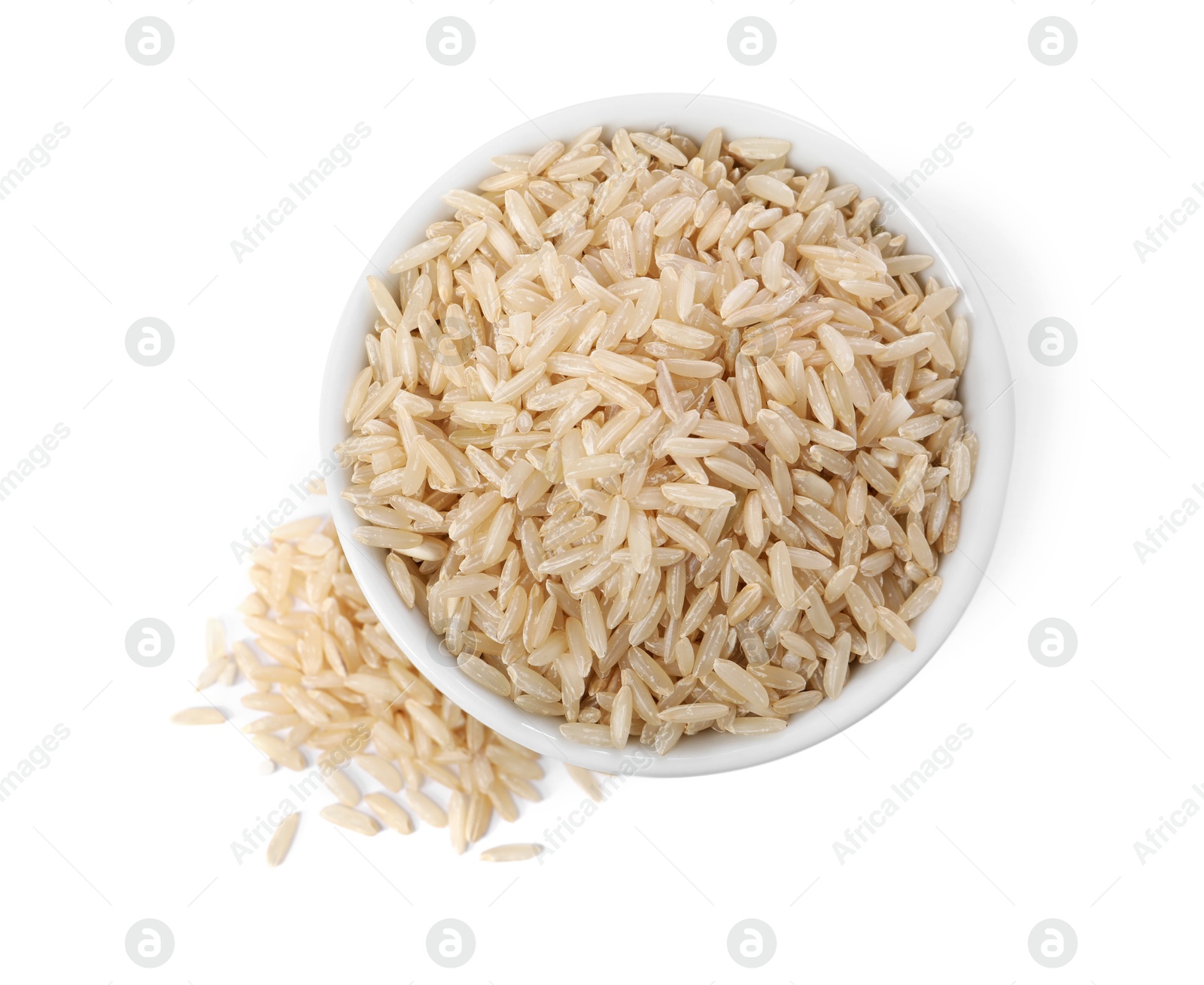 Photo of Raw rice in bowl isolated on white, top view