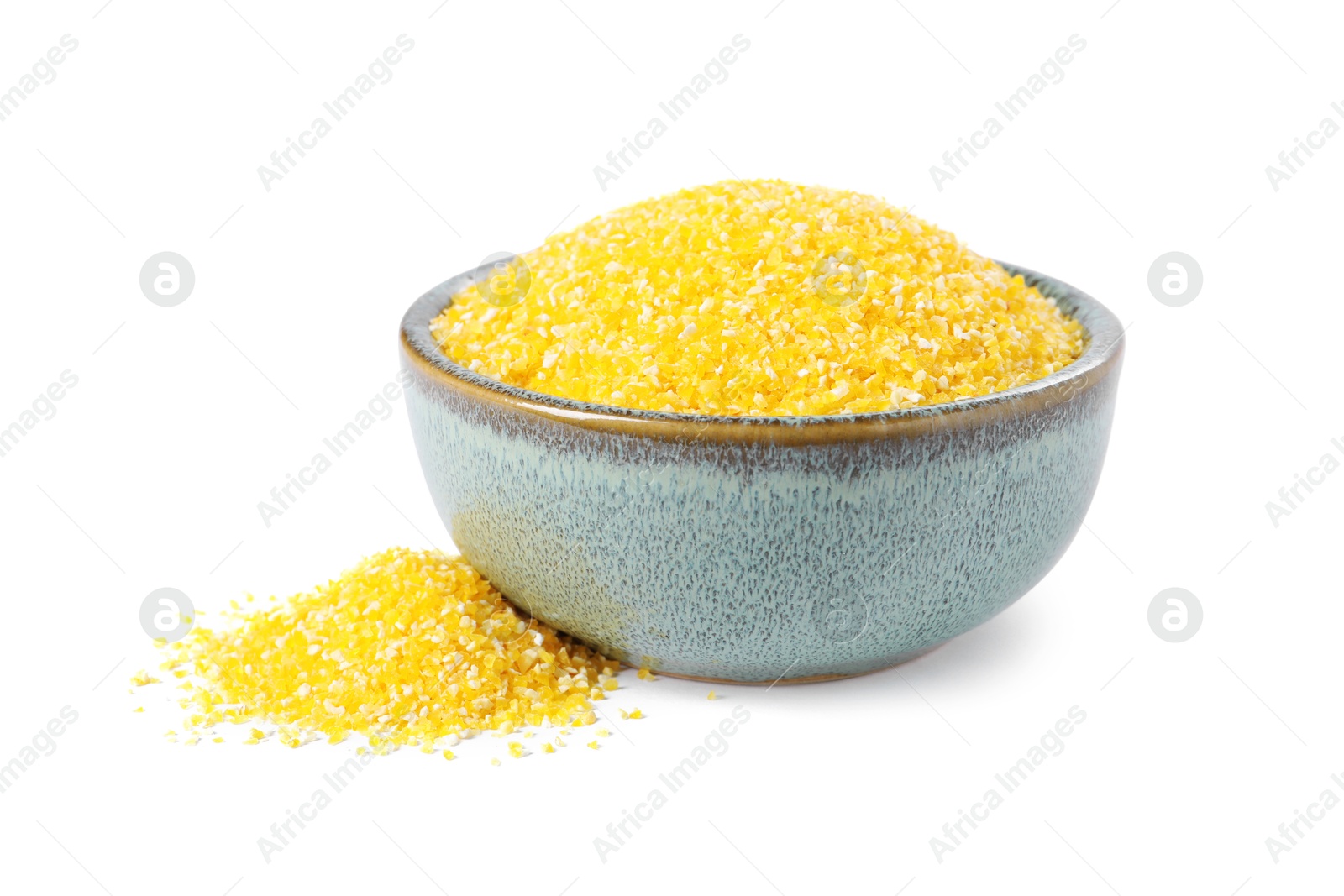 Photo of Raw cornmeal in bowl isolated on white