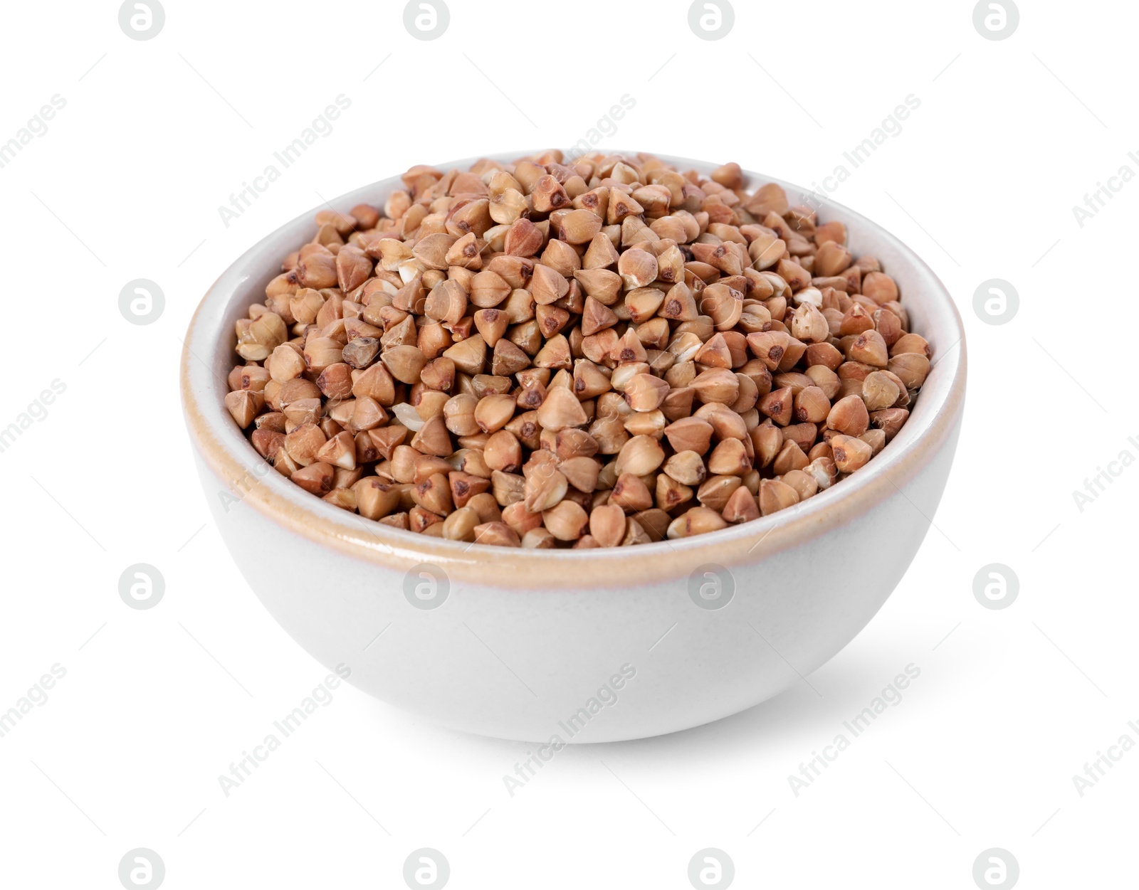 Photo of Raw buckwheat in bowl isolated on white