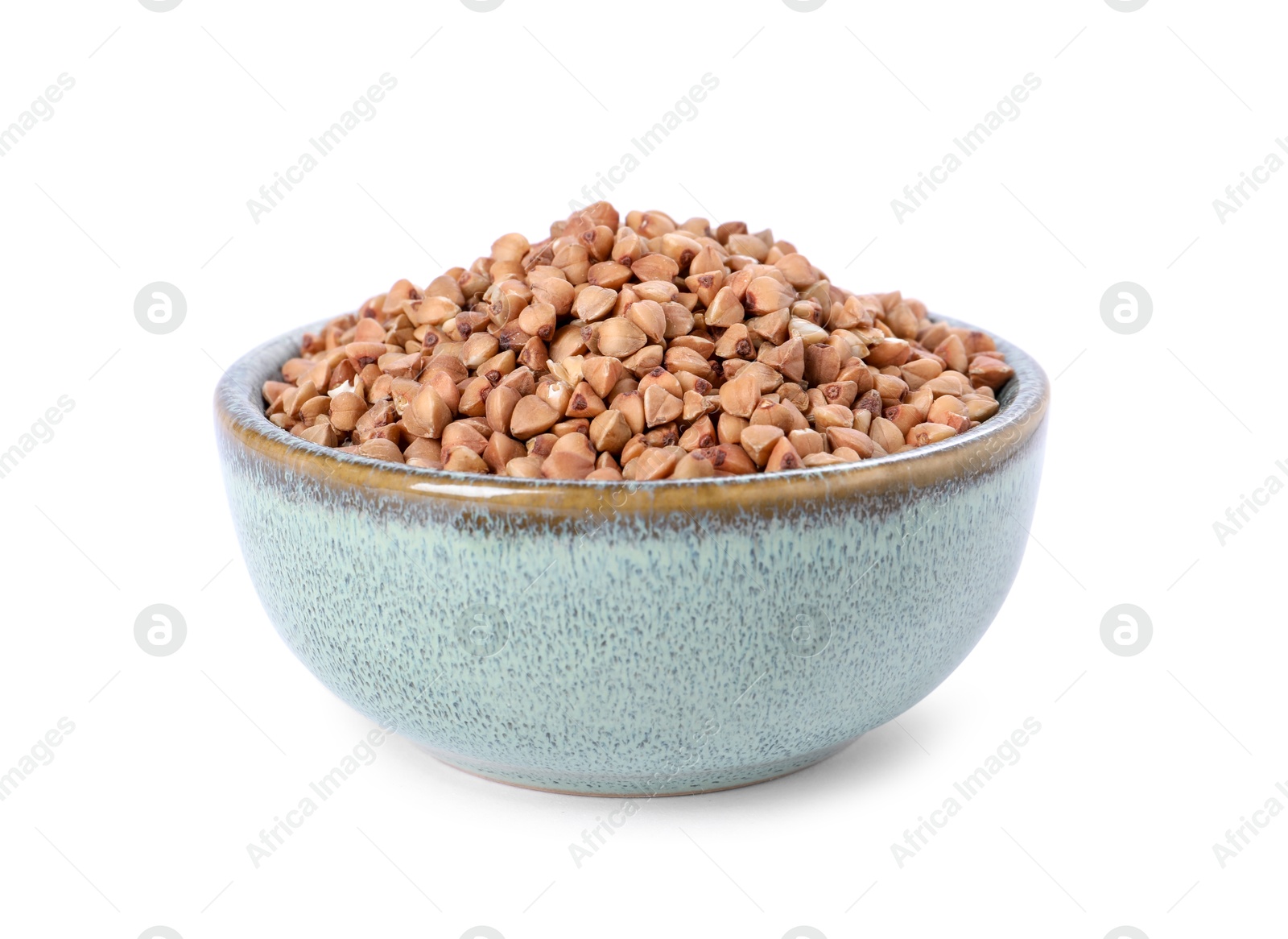 Photo of Raw buckwheat in bowl isolated on white