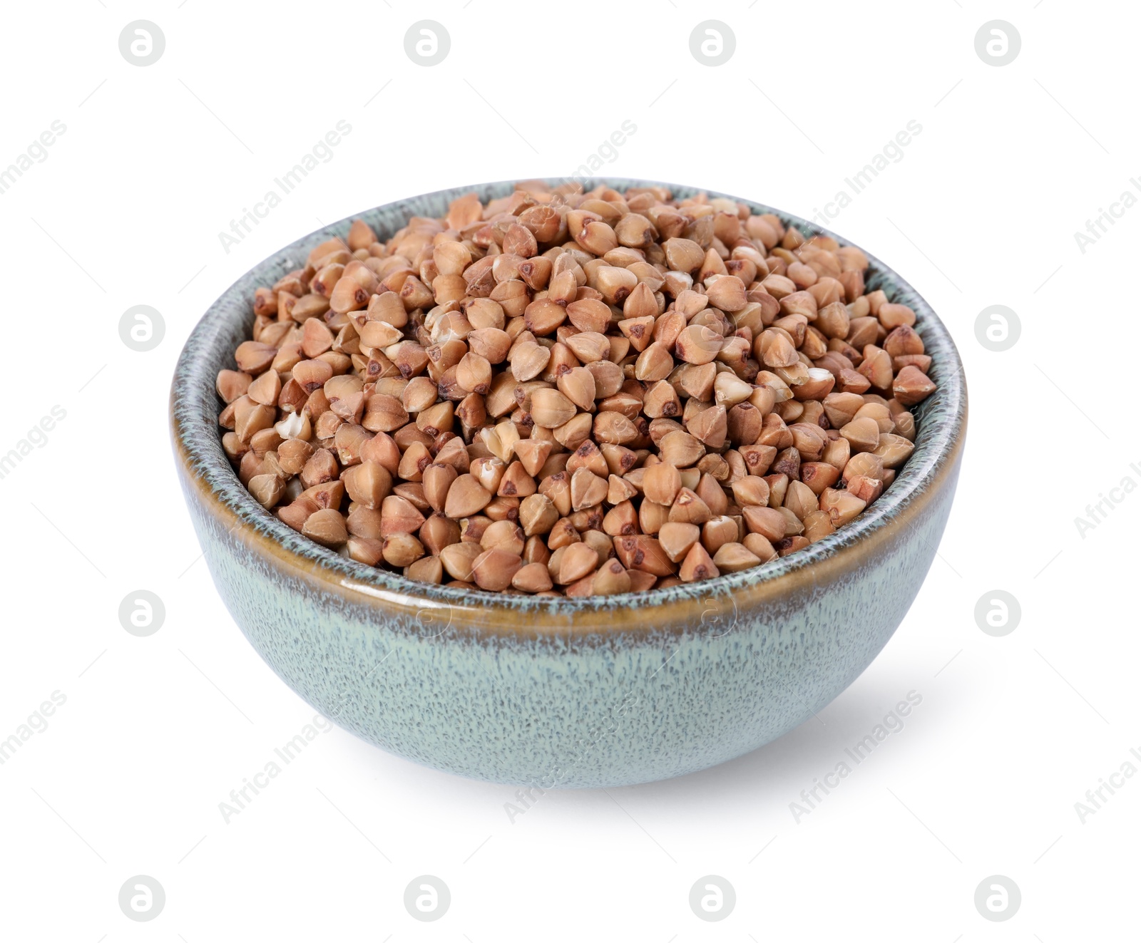 Photo of Raw buckwheat in bowl isolated on white