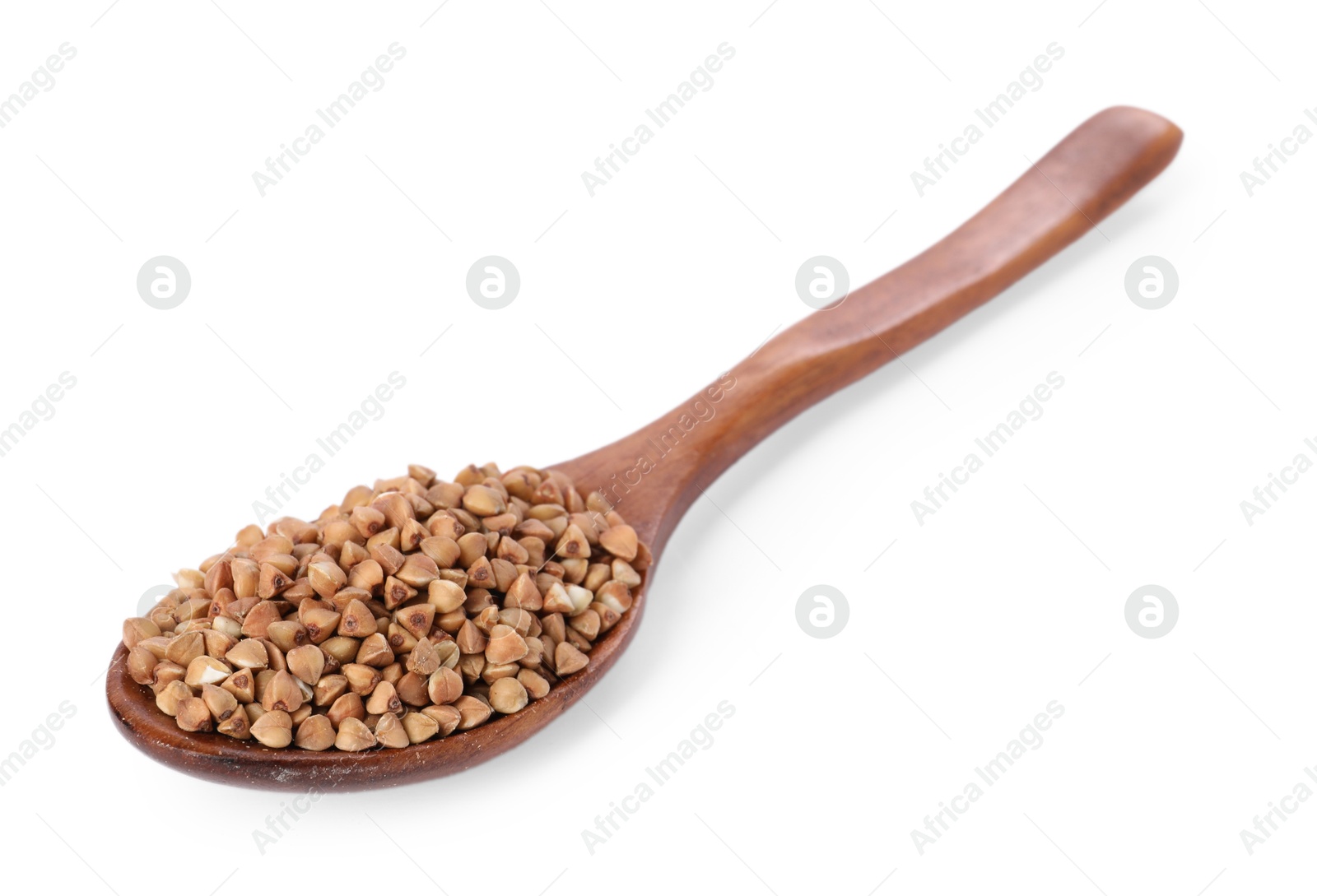 Photo of Raw buckwheat in wooden spoon isolated on white