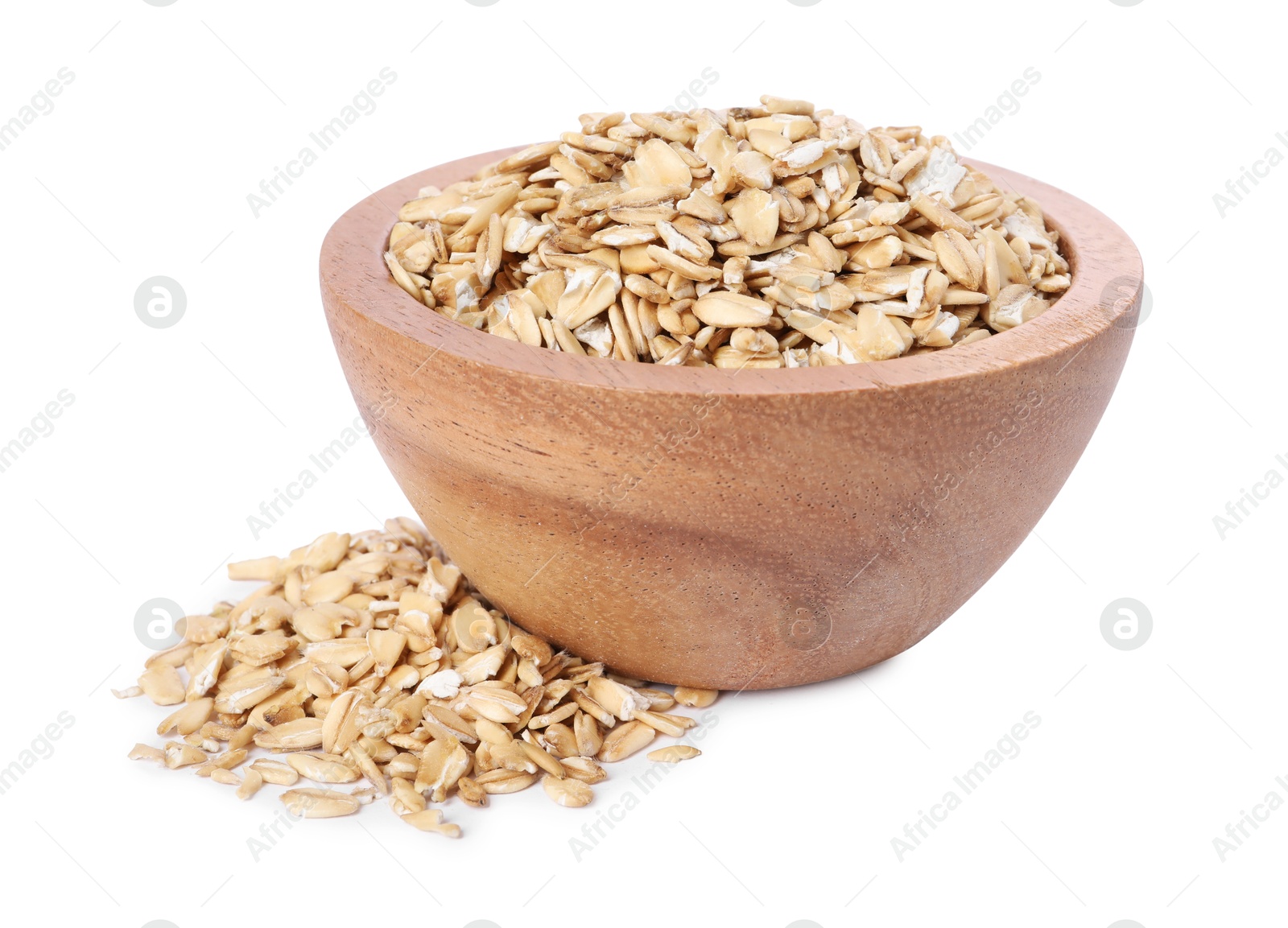 Photo of Dry oat flakes in wooden bowl isolated on white