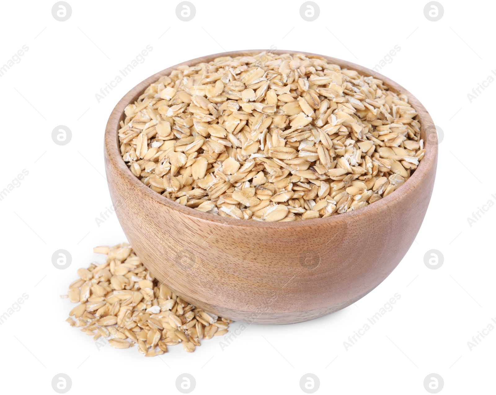 Photo of Dry oat flakes in wooden bowl isolated on white