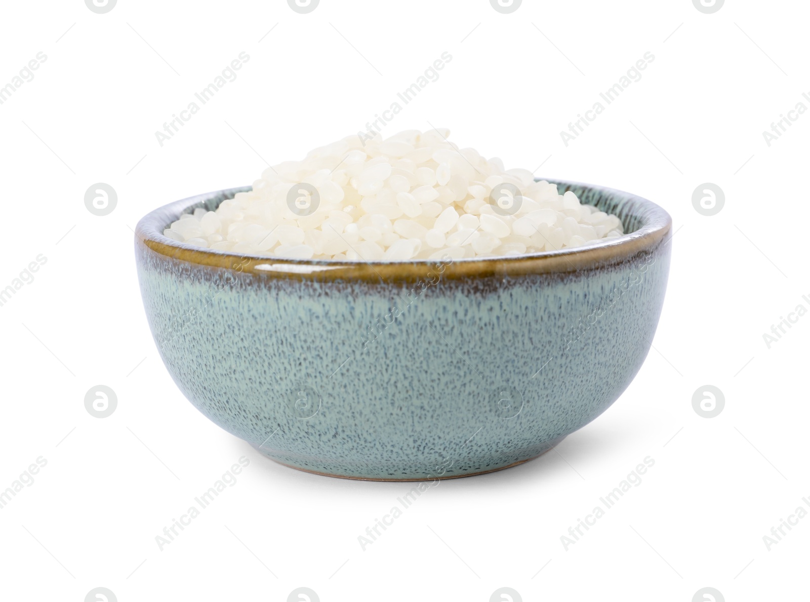 Photo of Raw rice in bowl isolated on white