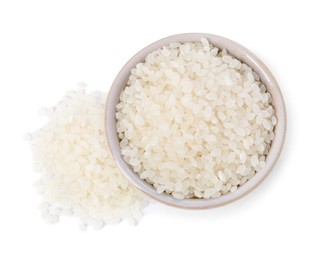 Raw rice in bowl isolated on white, top view