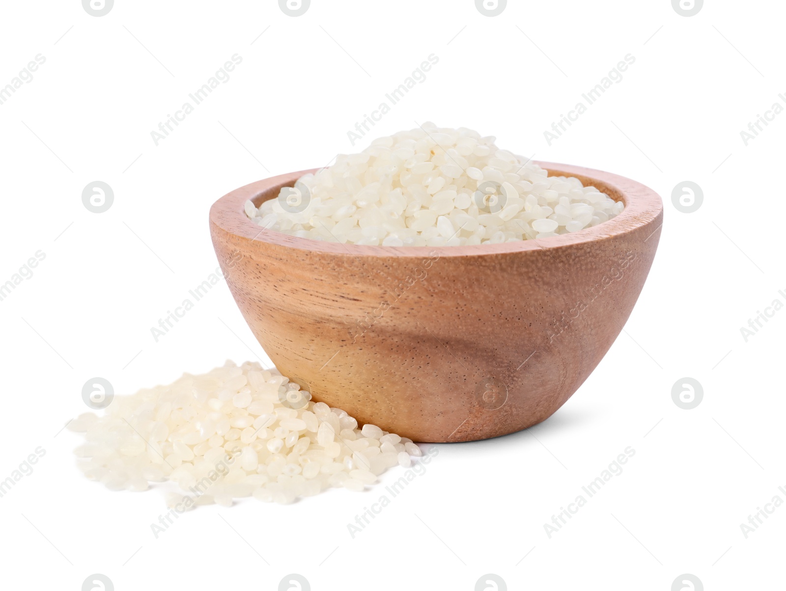 Photo of Raw rice in wooden bowl isolated on white