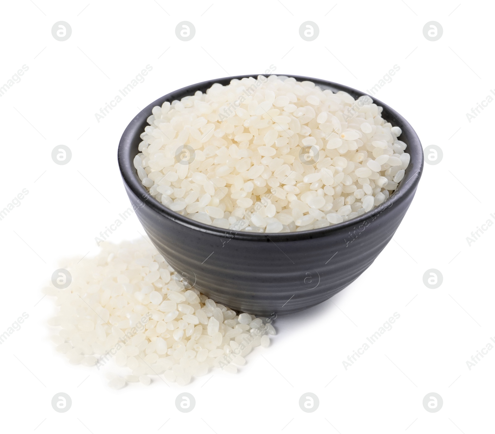 Photo of Raw rice in bowl isolated on white