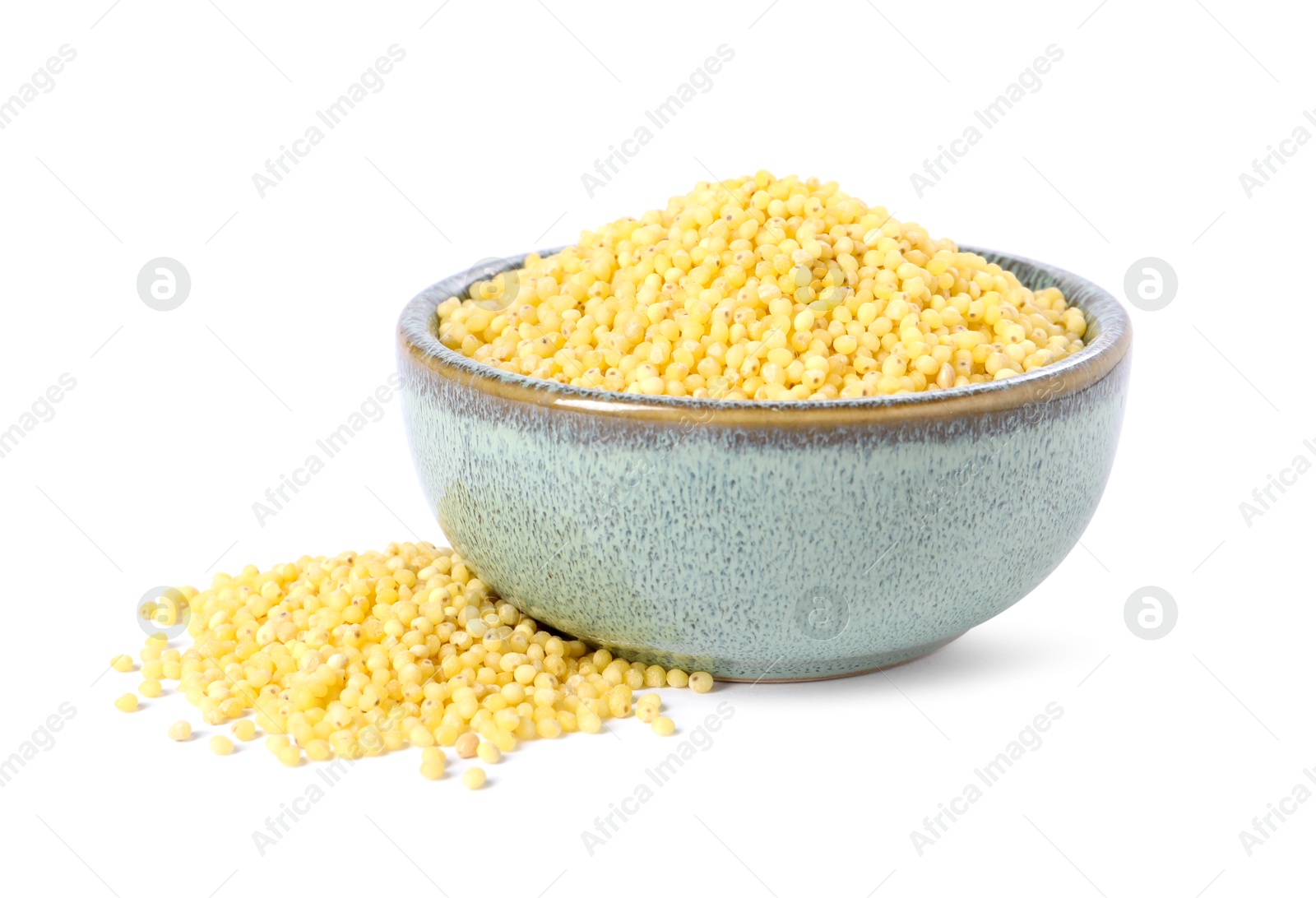 Photo of Millet groats in bowl isolated on white